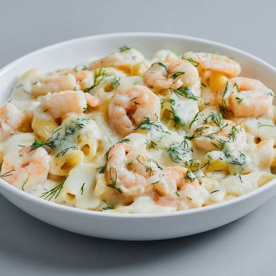 Penne Pasta With Shrimp In White Sauce And Mozzarella Cheese