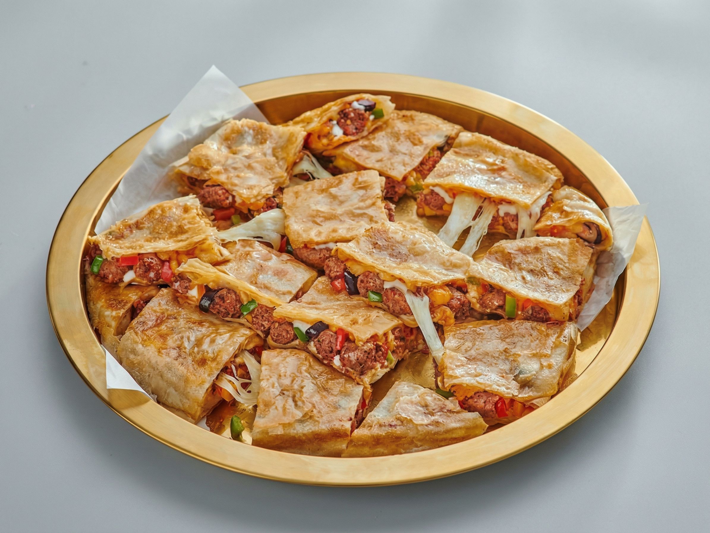 Sausage pie with basturma and Kiri