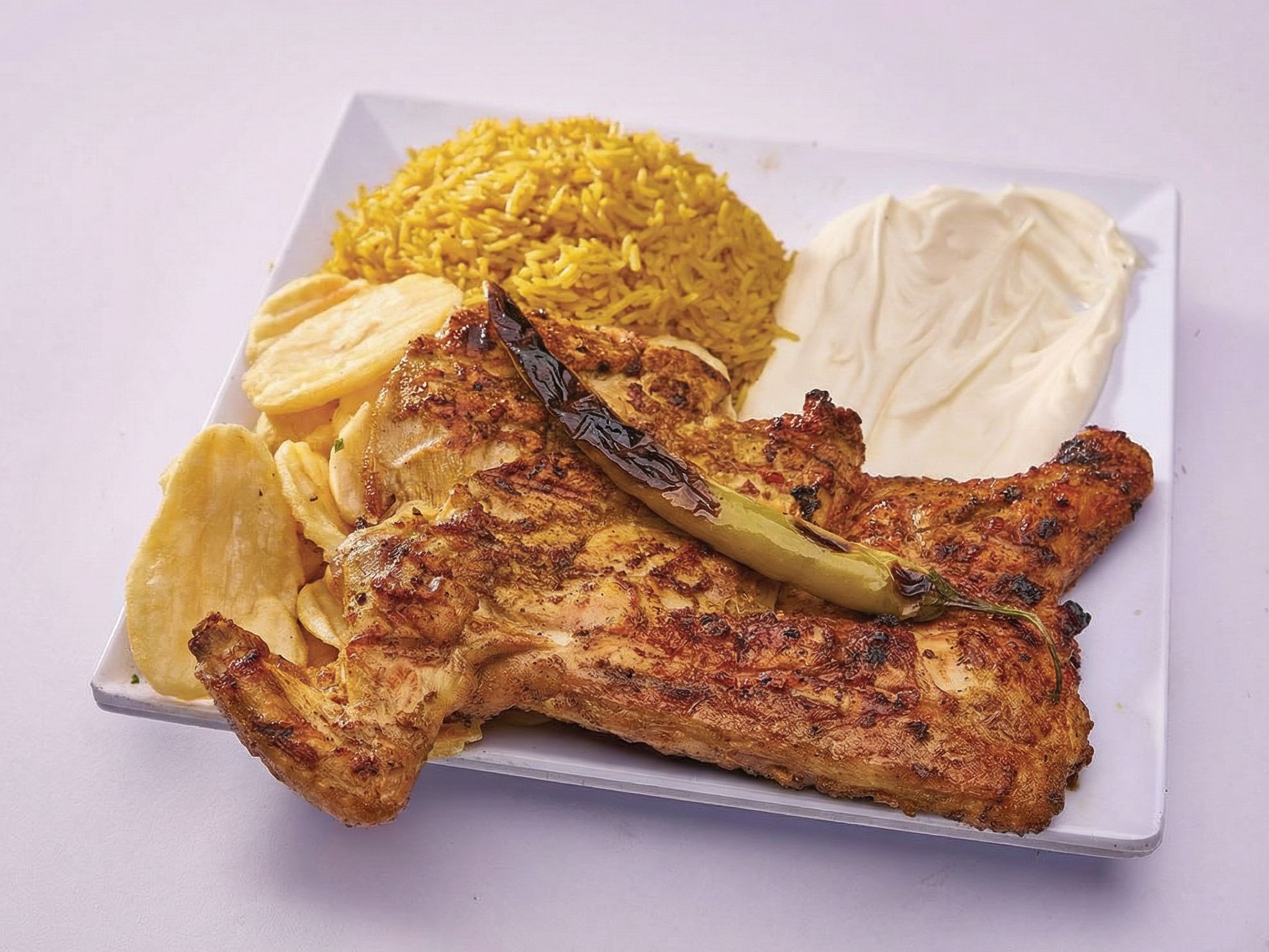 Boneless half chicken with rice