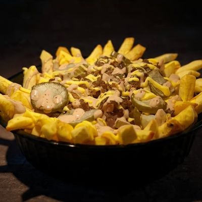 Smashed Beef cheese Fries and caramelized onion jam
