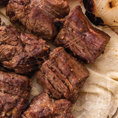 Half grilled meat kebab