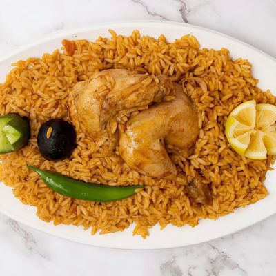 ربع دجاجة كبسة