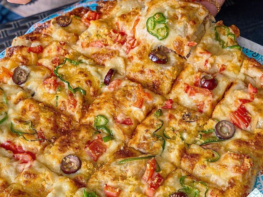 Alexandrian Sausage Oriental Pizza