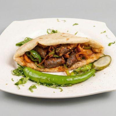 Alexandrian sausage in baladi bread