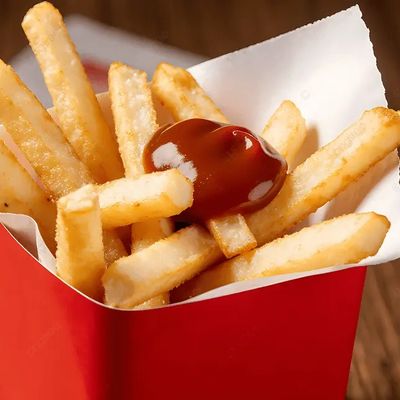 Small packet of French fries with ketchup