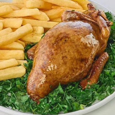 أرز بالحمام المحشي أو فريكة مع قشطة