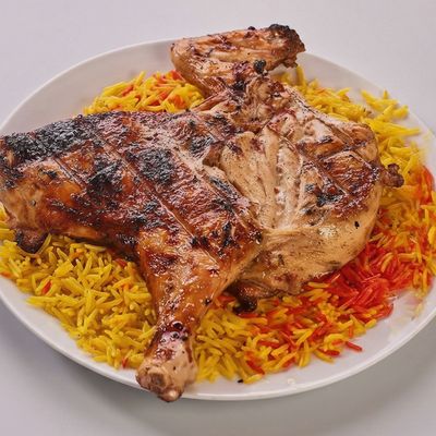 1/2 Grilled or Mandi Chicken + Rice + Salads