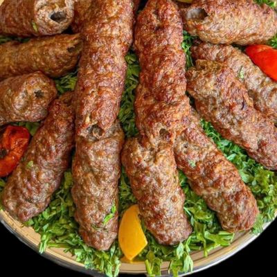 Quarter portion of grilled kofta with rice