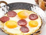 Fried eggs with Turkish sausage
