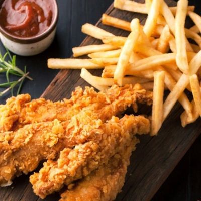 Chicken Strips Slices With Basmati Rice And Frensh Fries