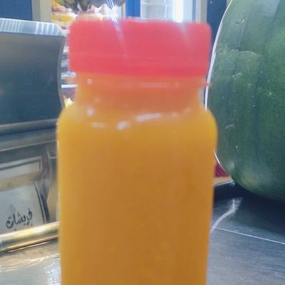 Mango juice bottle