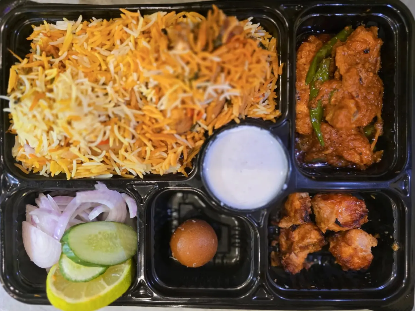 Chicken Biryani, Chicken Karahe, Bbq Chiken Tikka Boti, Gulab Jaman, Salad And Raita.
