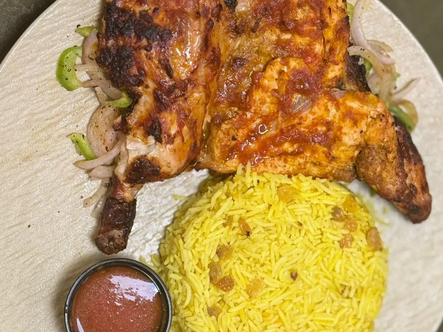 نصف دجاجه مع الارز