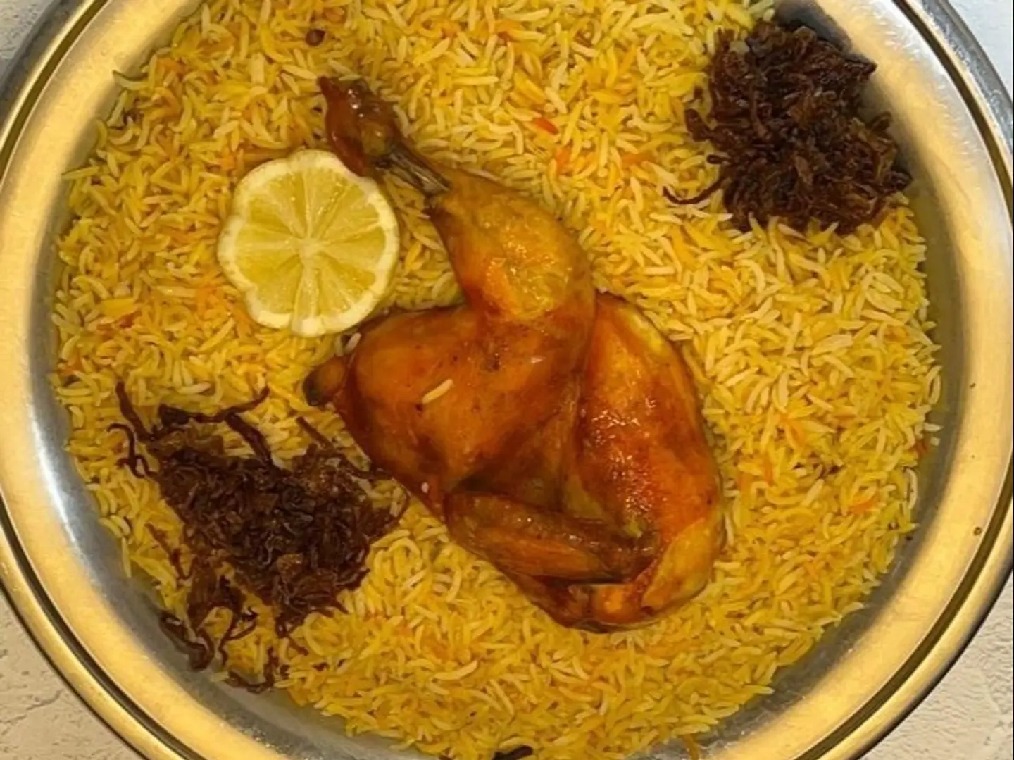 نص حبة مندي دجاج