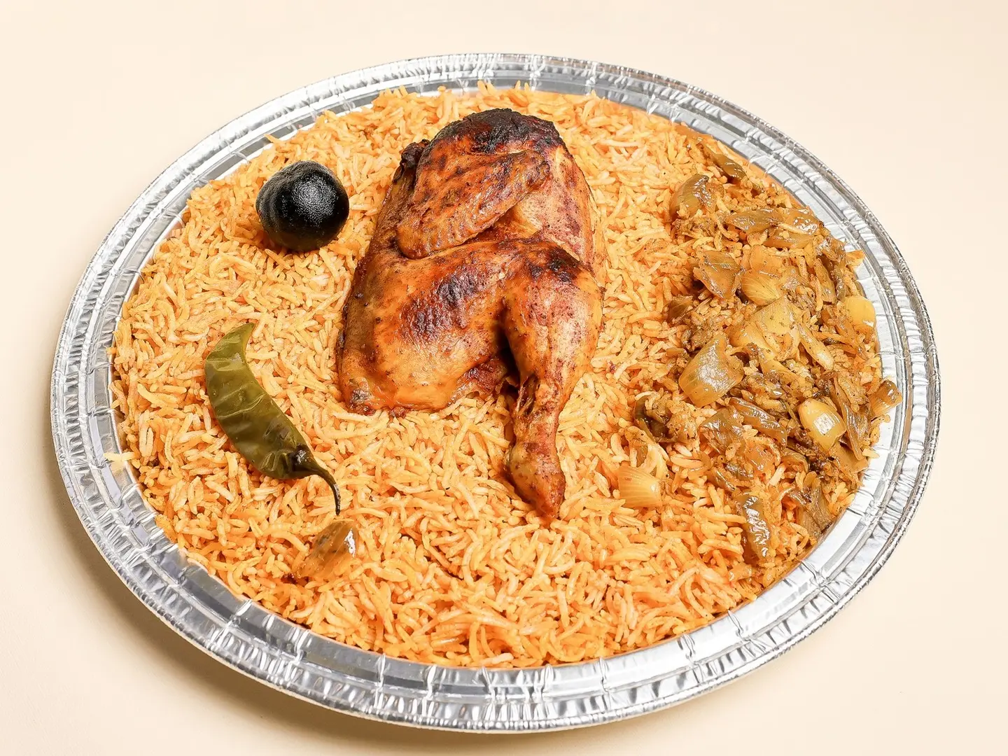 نص دجاجة كبسة حساوية