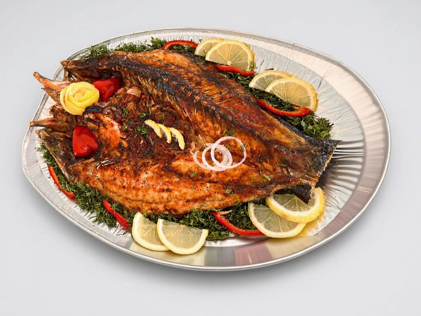 سمكة سيباس مشوي فرن