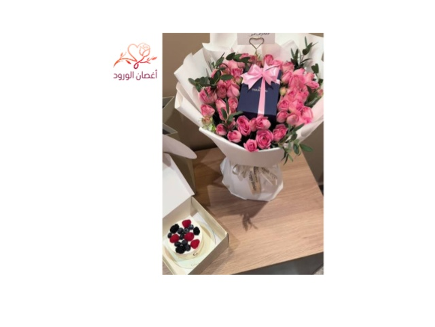 A Bouquet Of Roses With Cake And A Swarovski Necklace