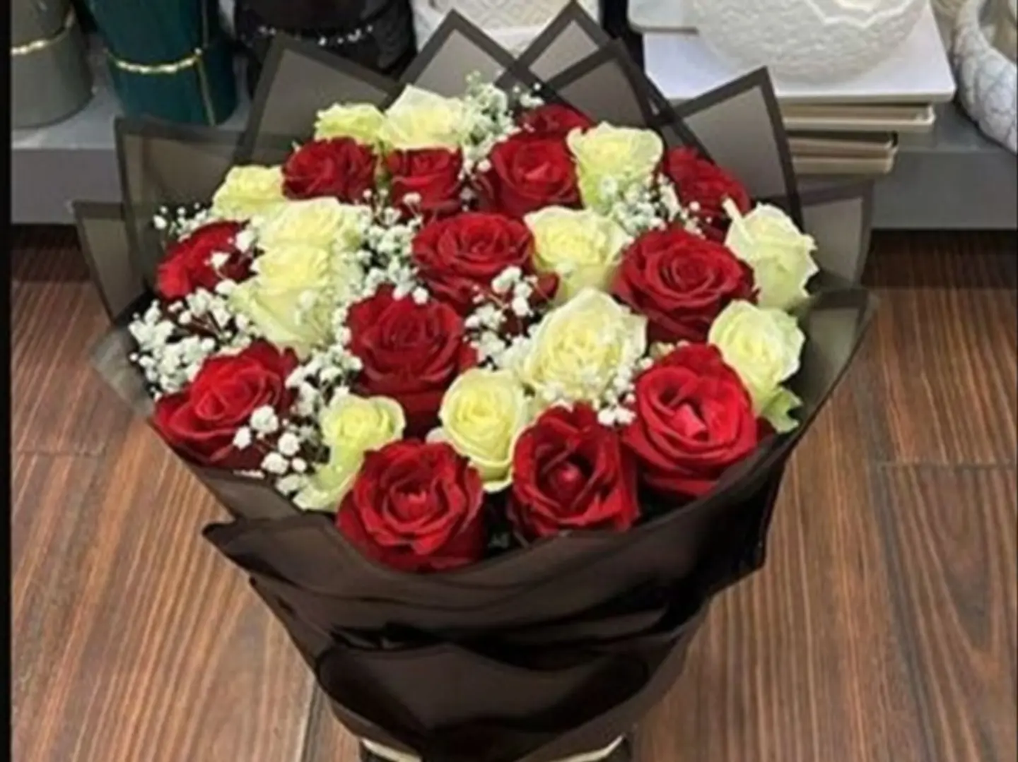 A Bouquet Of Red And White Roses
