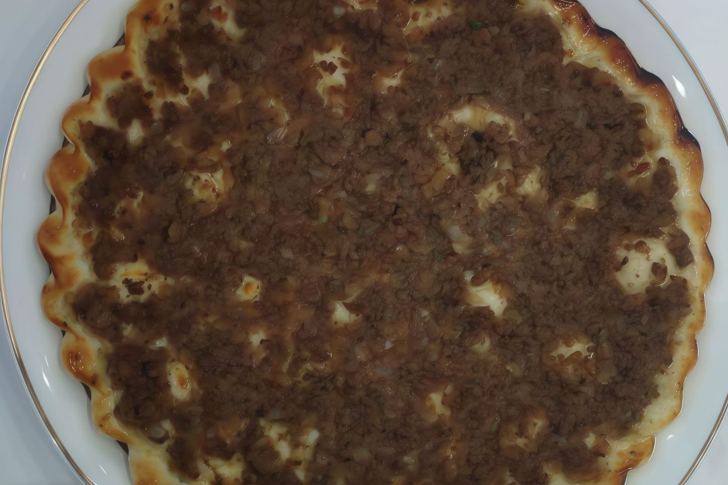 Naimi Meat Manoushe With Pomegranate Molasses