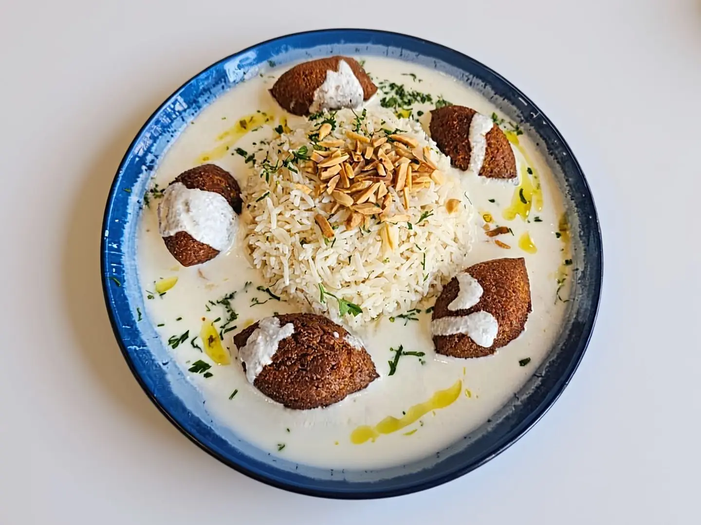 A Plate Of Kibbeh With Milk