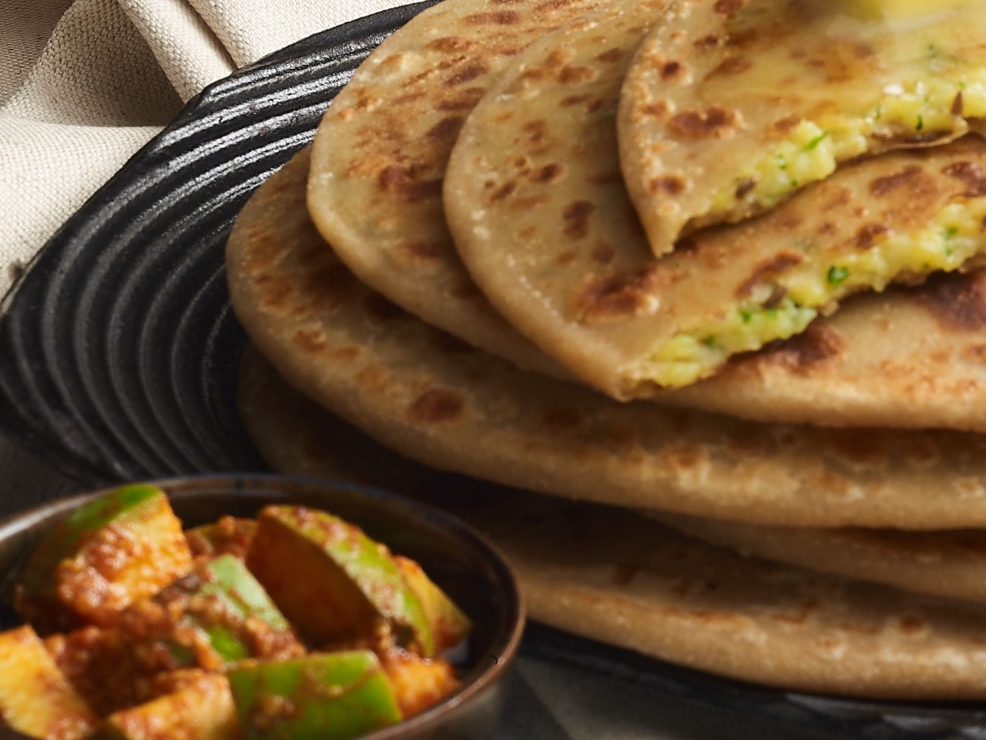 Paneer Paratha With Raita, Pickle & Papad