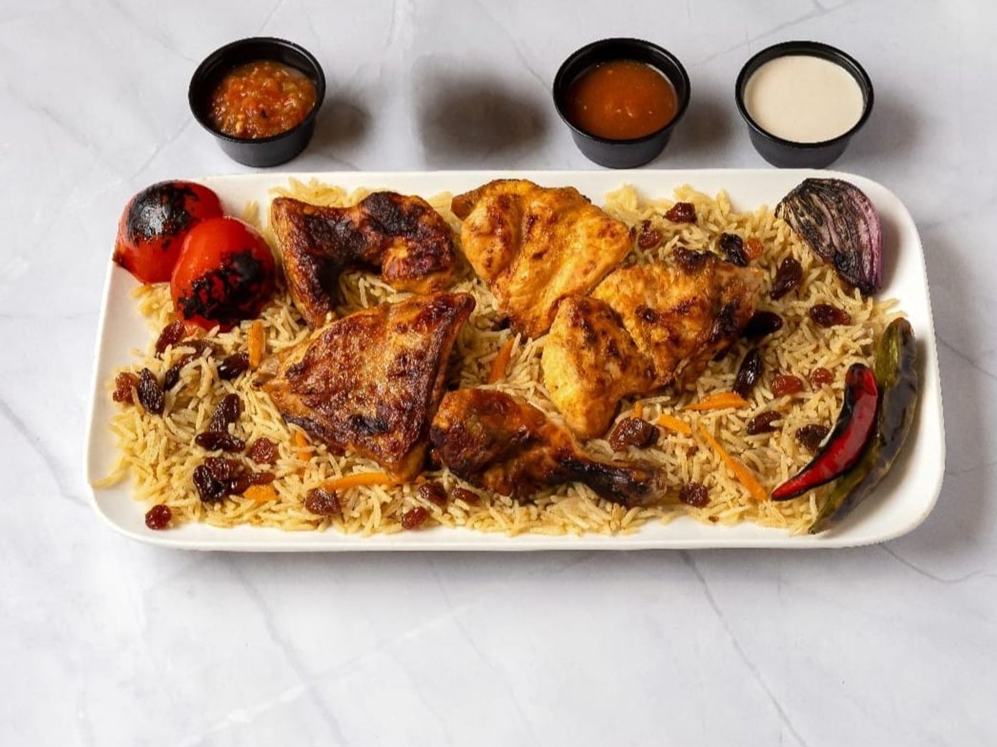 Half A Chicken Grilled On Charcoal With Rice