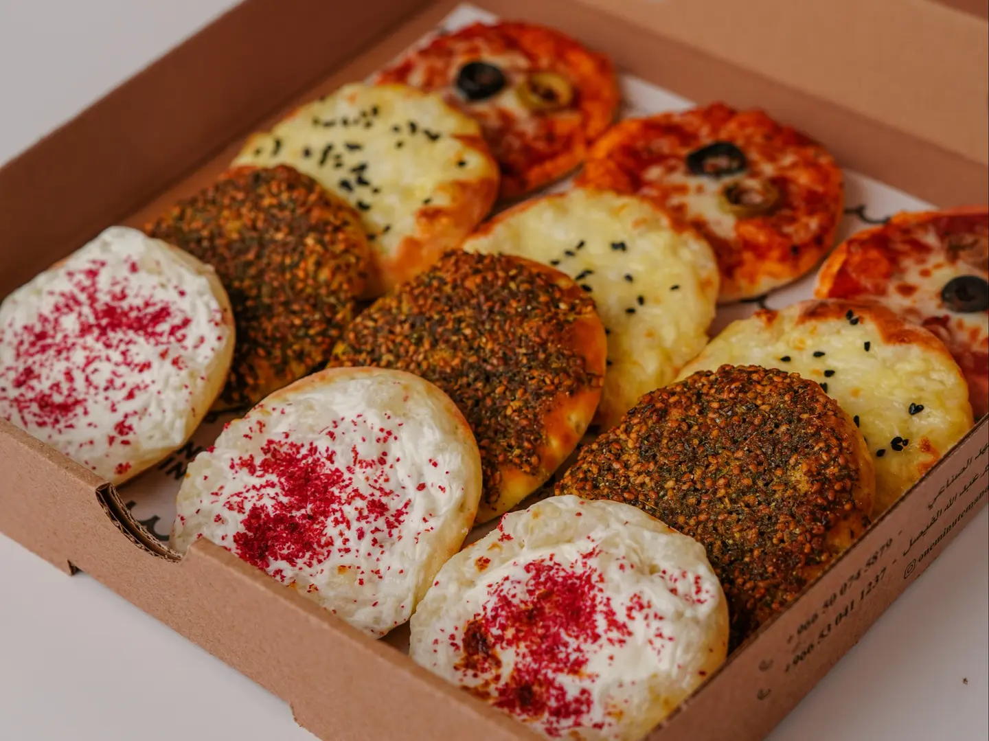 Mini Manousheh 3 Cheese  3 Labneh   3 Zatar3 Cheese Pizza With Olive