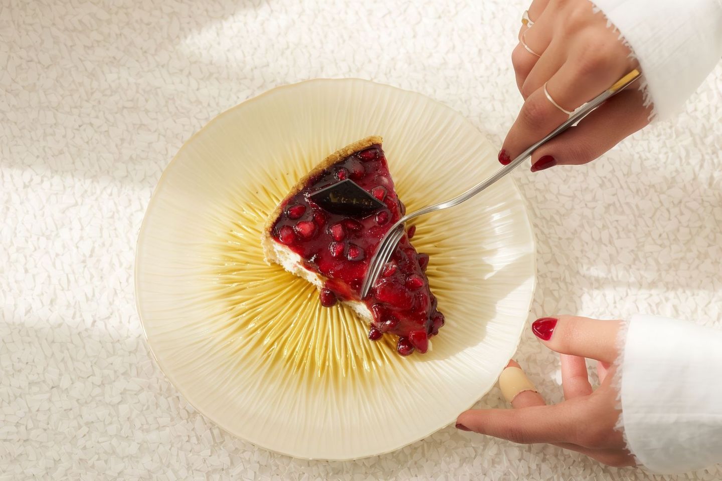 A Piece Of Pomegranate Cheesecake