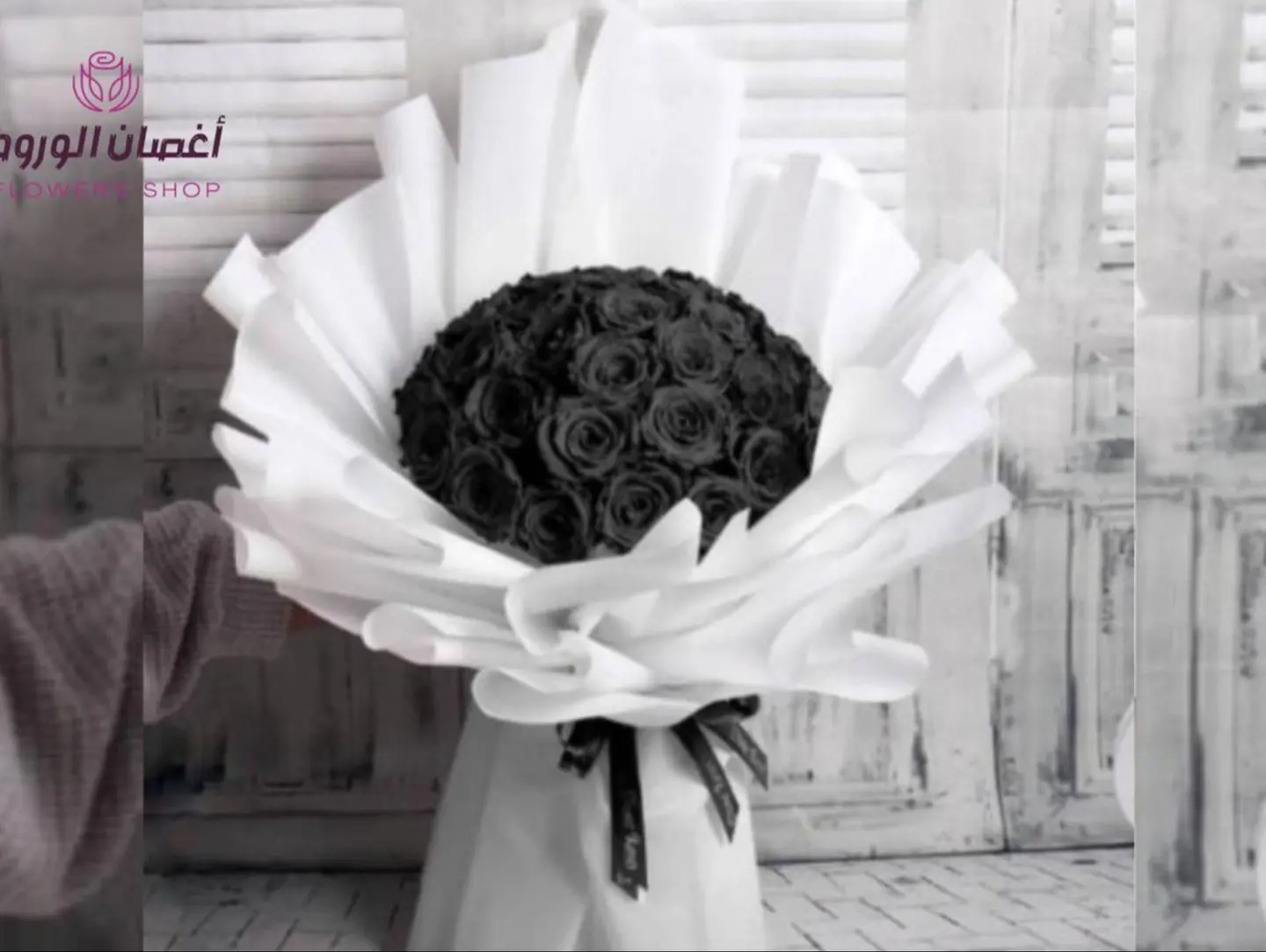 Black Rose Bouquet With White Wrapping