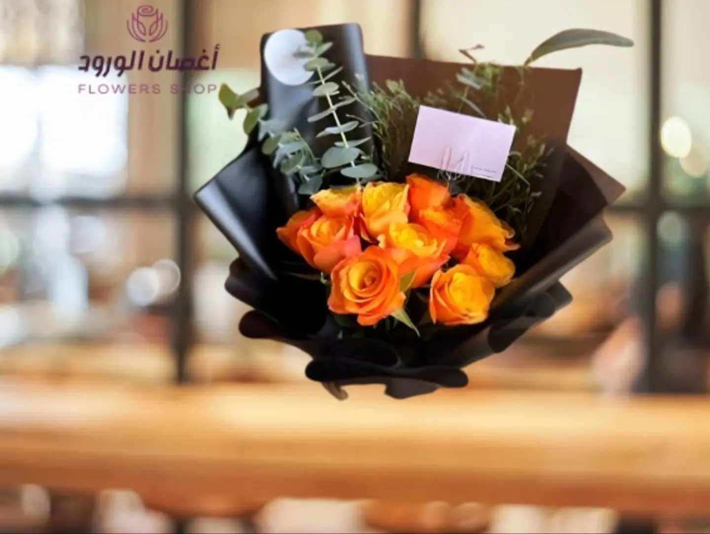 Orange Flower Bouquet, Black Wrap