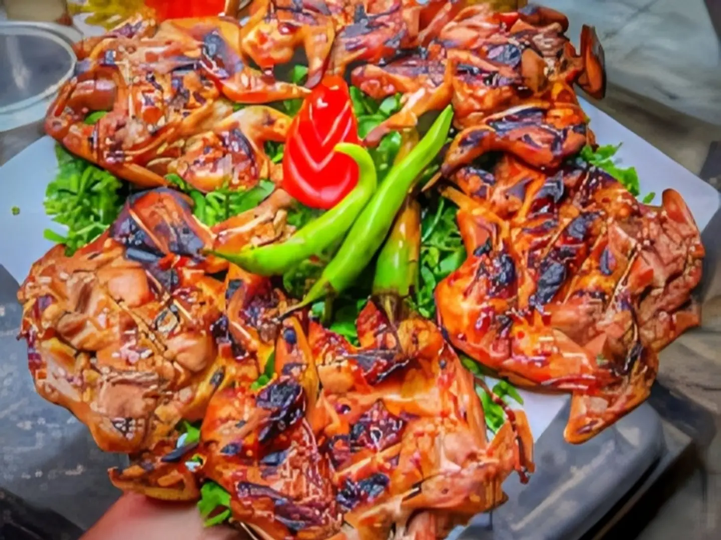 Two Grilled Quails On Charcoal