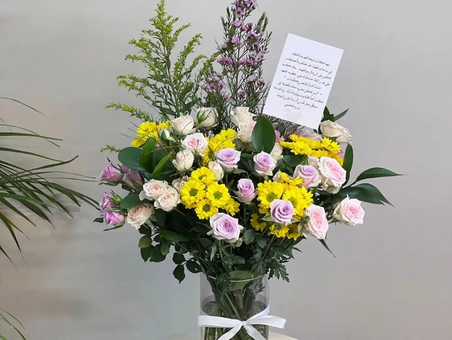 A Vase With Vibrant Roses