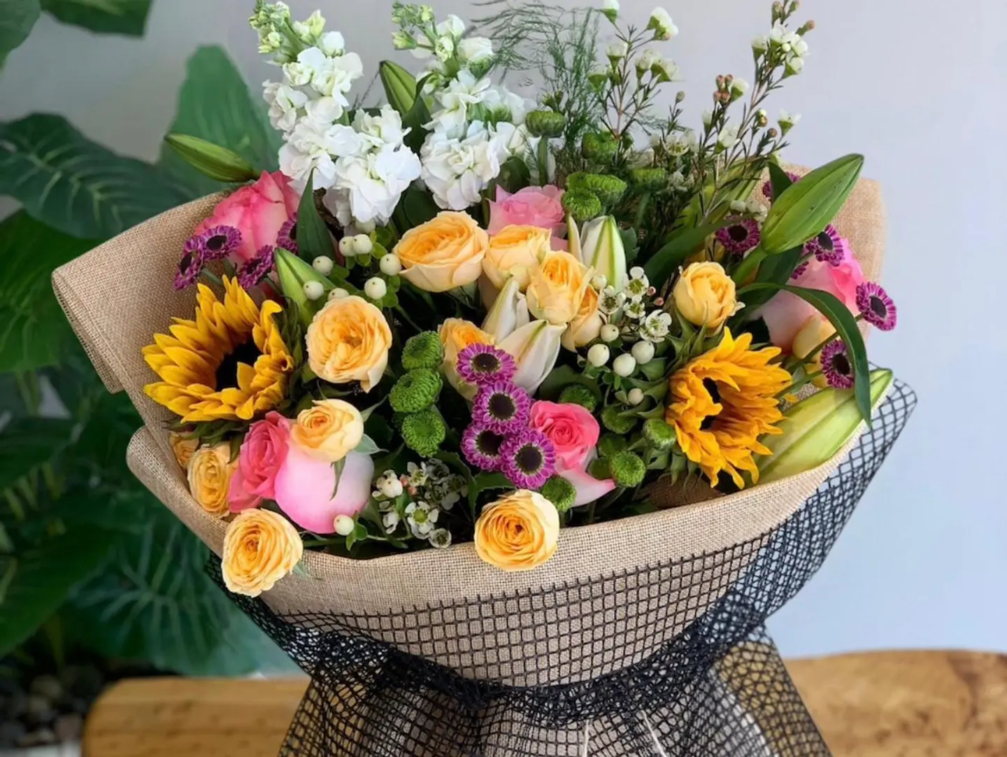 Bouquet In Cheerful Fabric Wrapping