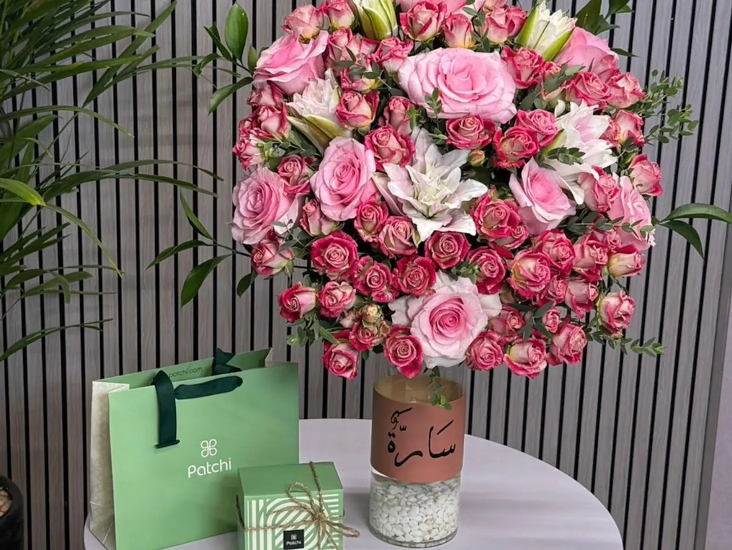A Vase Arrangement With A Name, Luxurious Roses, And Patchi