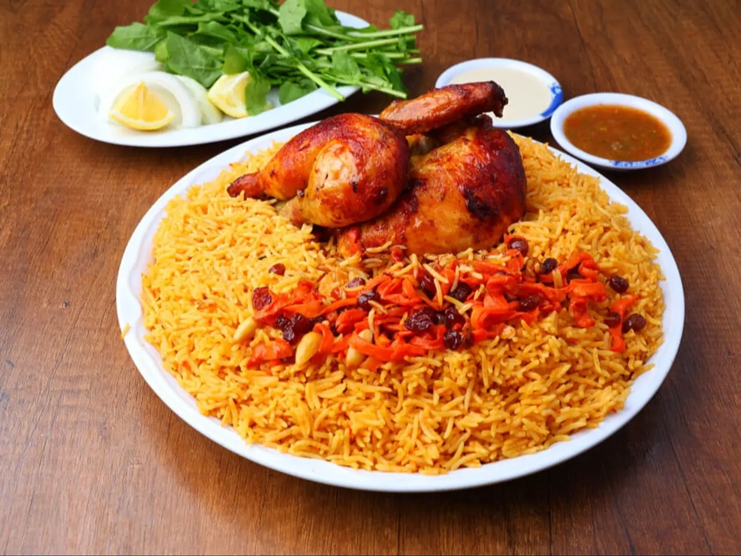 Half A Piece Of Grilled Chicken With Spiced Rice