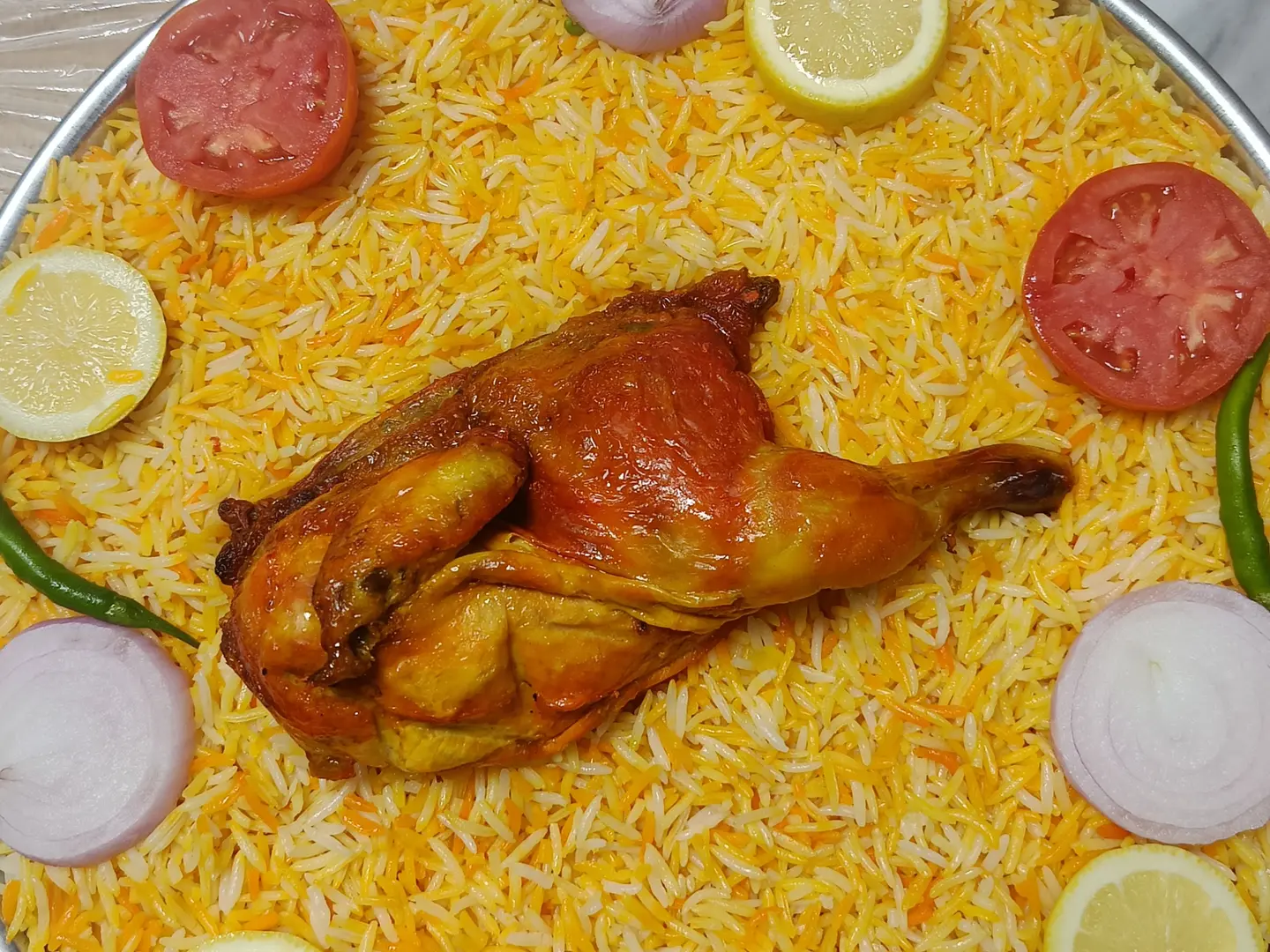 مندي نصف دجاجة مع أرز