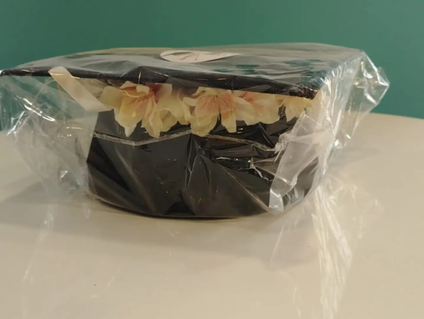 Graduation Cap With White Flowers