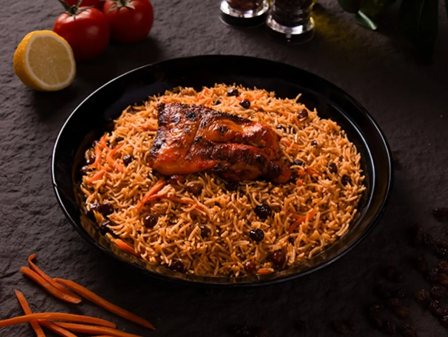 A Quarter Grilled Chicken Leg With Rice