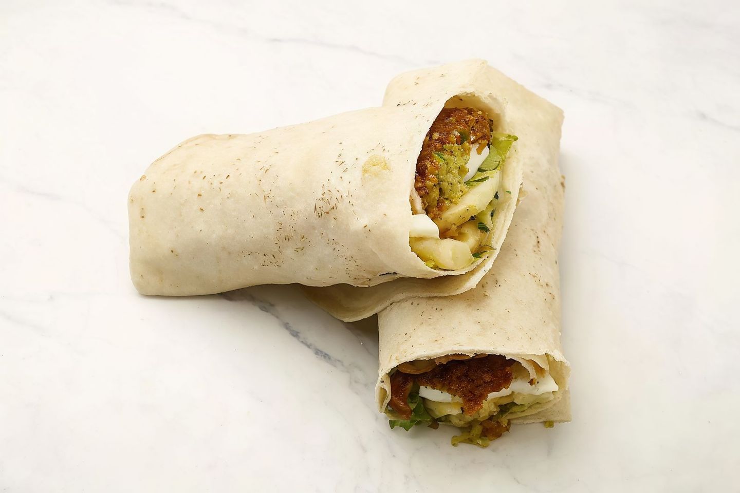 Falafel Sandwich With Eggs And Hummus