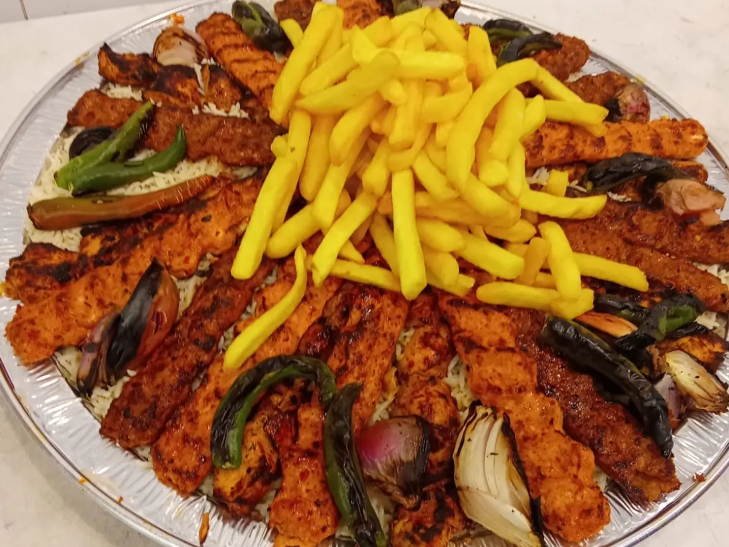 A Plate Of Two Kilos 24 Skewers With Rice