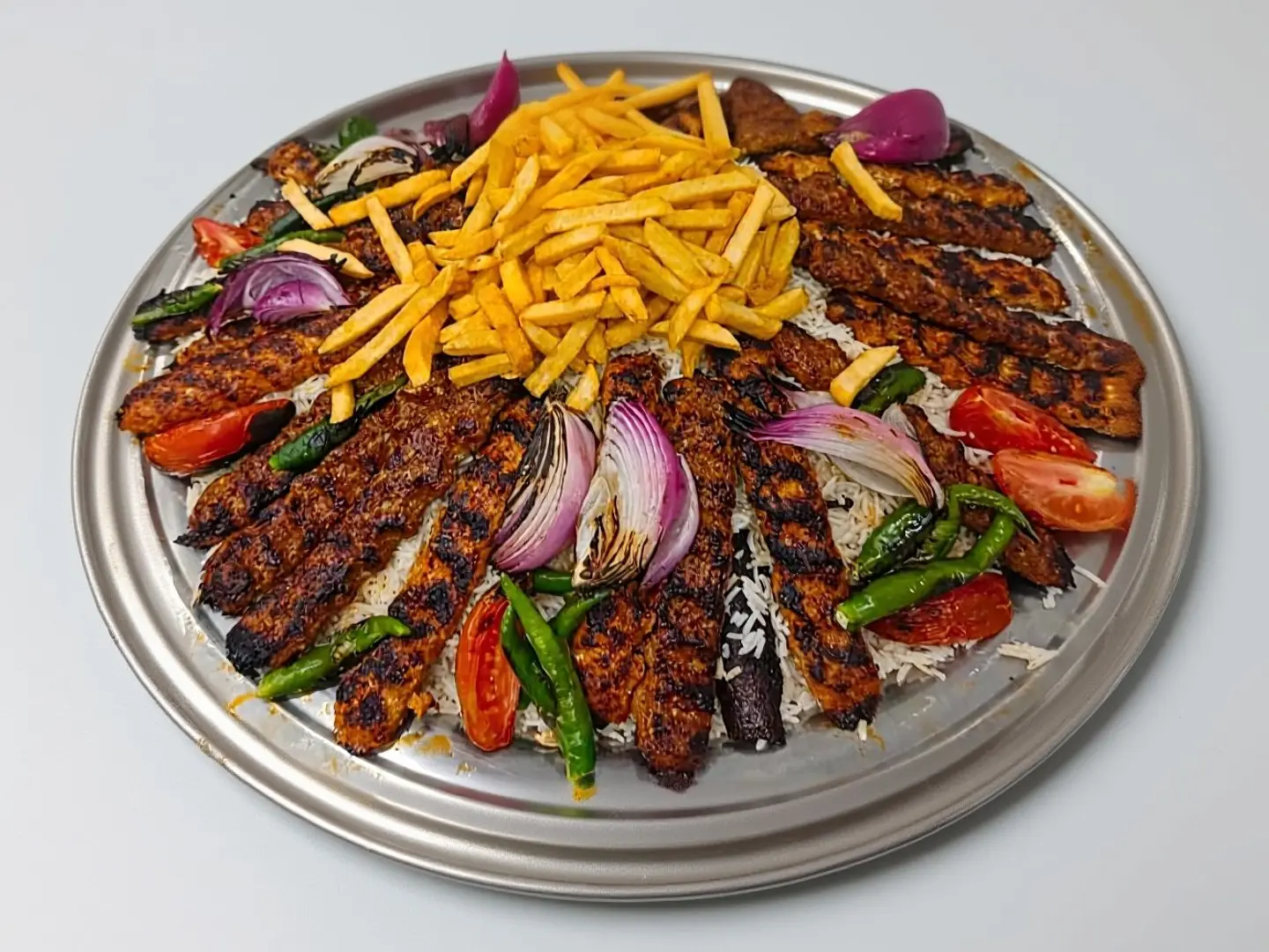 ‏A Plate Of Three Kilos 36 Skewers With Rice