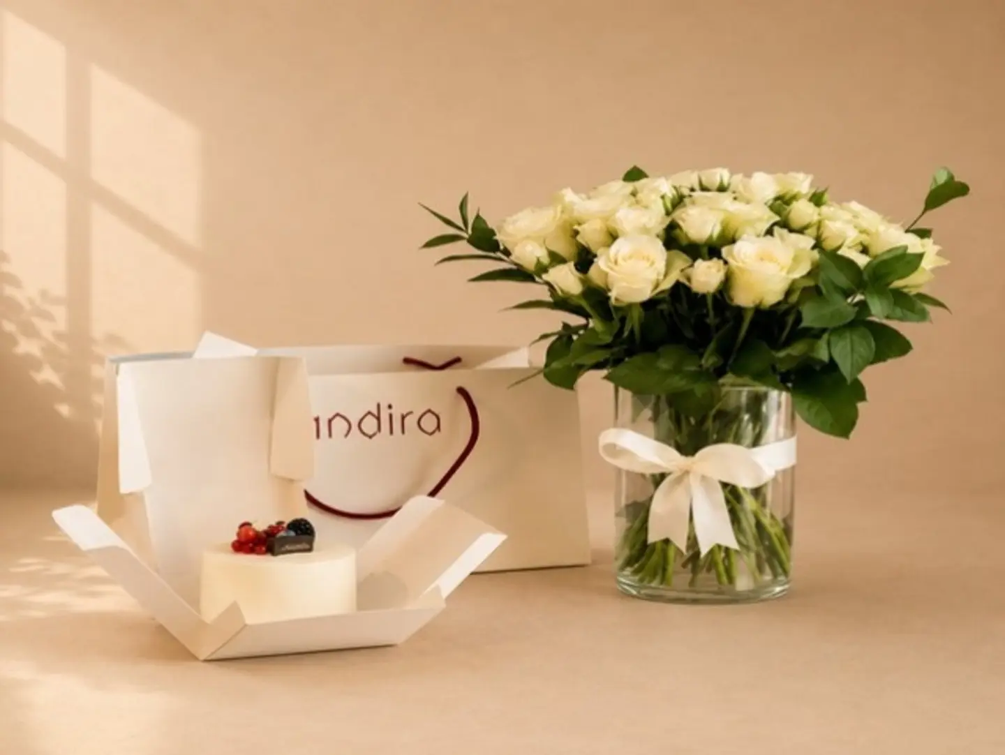 A Flower Vase And A Berry Cupcake.