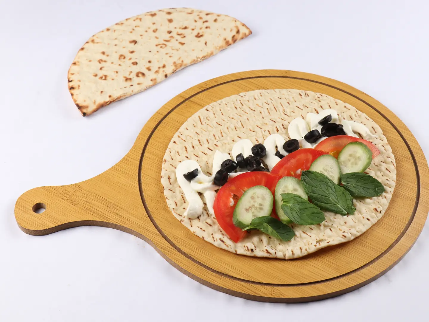 خبز الصاج السعودي باللبنة