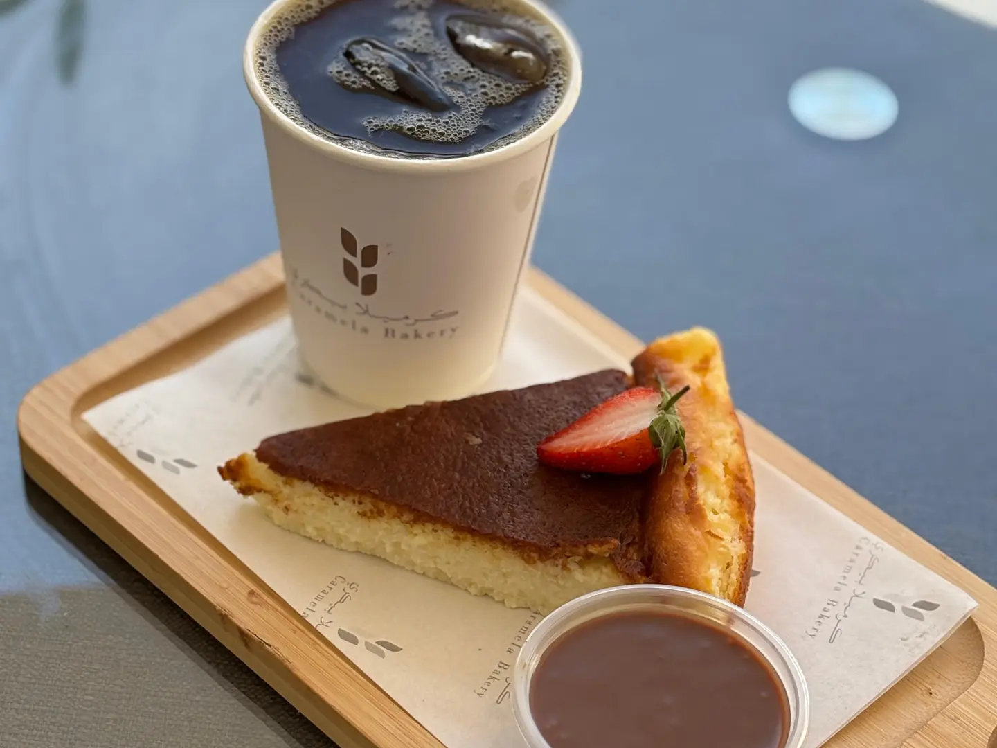 San Sebastian And Chocolate Sauce With Coffee
