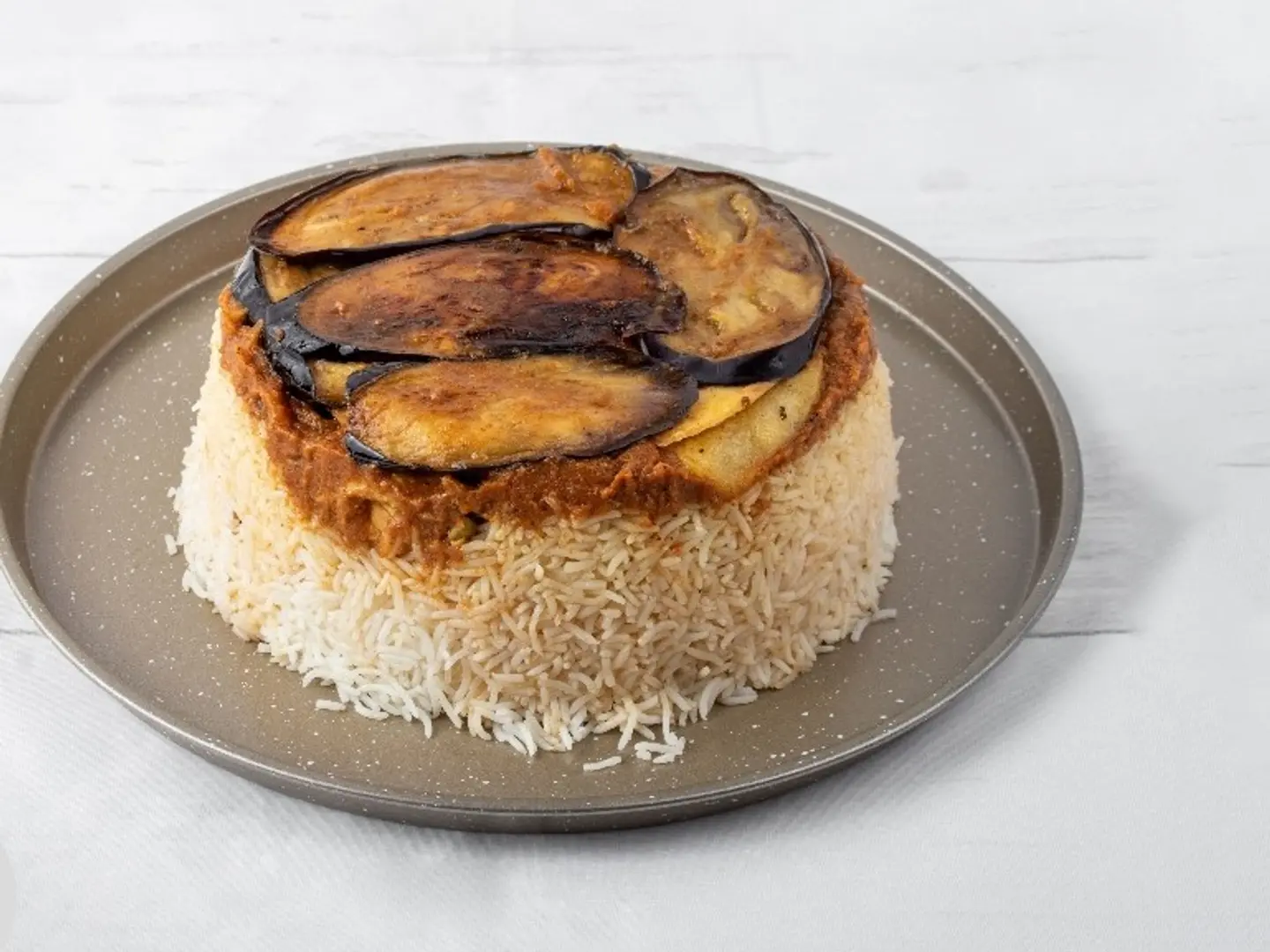 Chicken Cooked Upside Down With Rice And Vegetables.