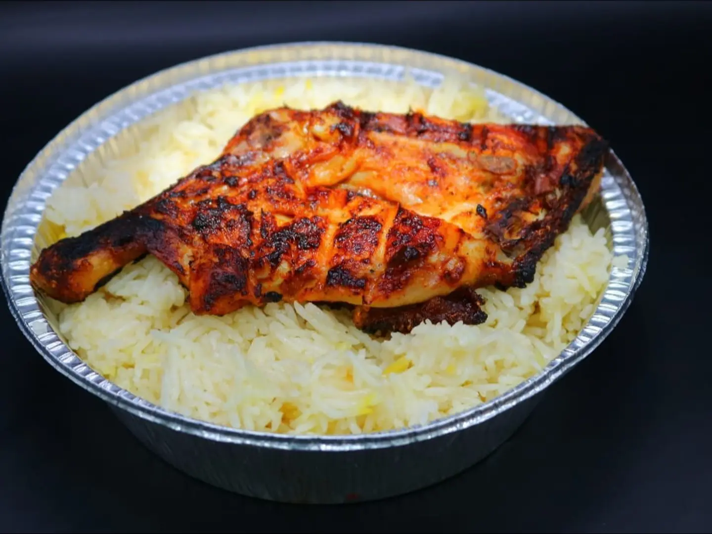ربع دجاج على الفحم مع الرز