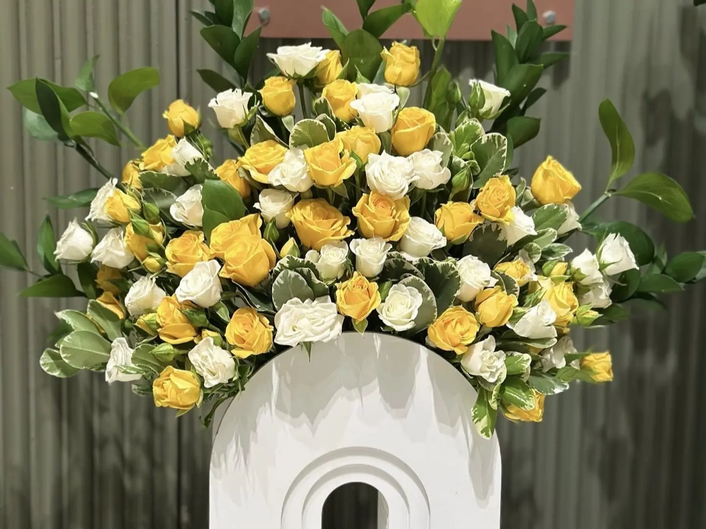 Natural Roses With A Wooden Vase