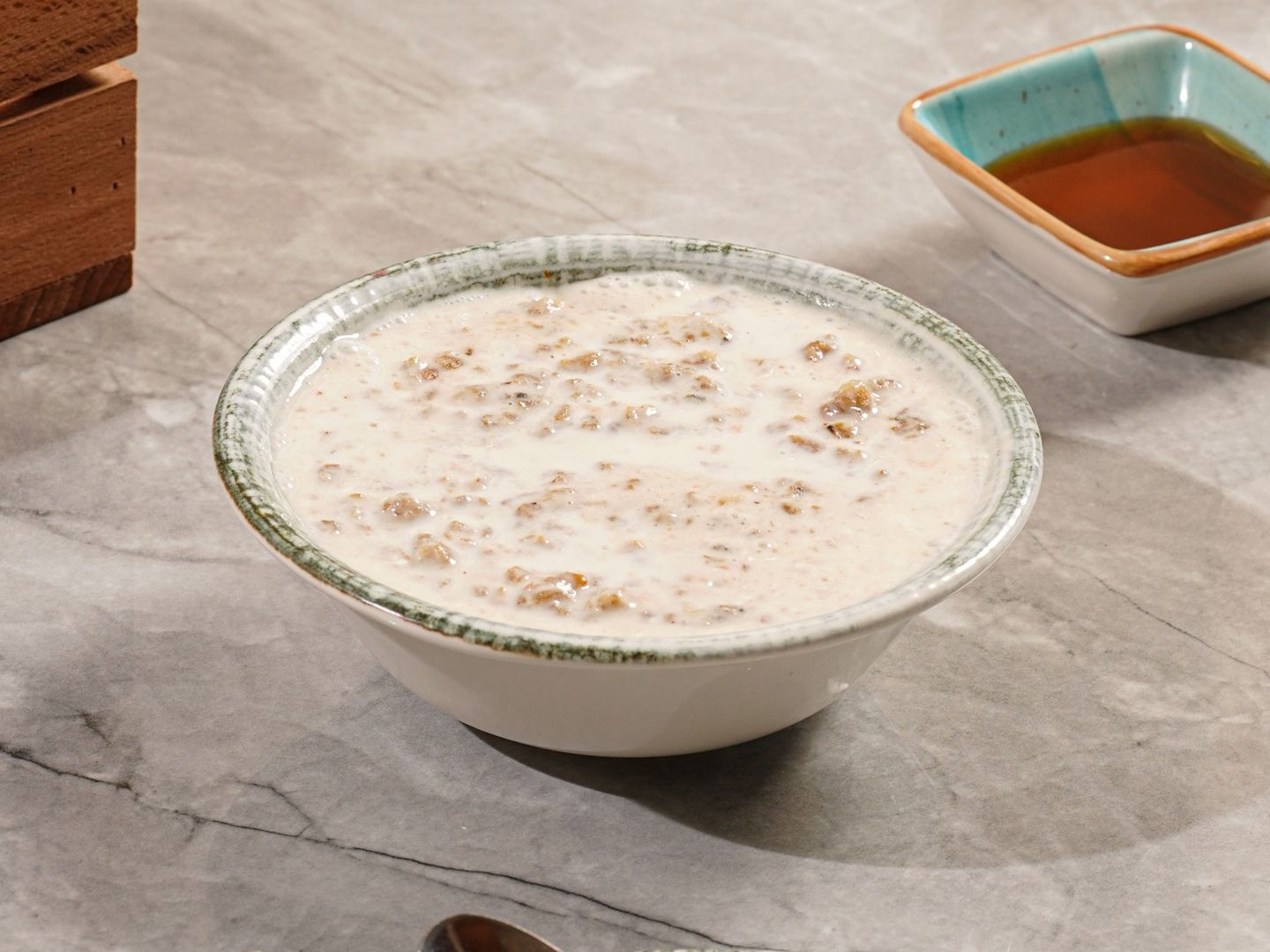 Masoub With Cream And Milk And Honey And Dates