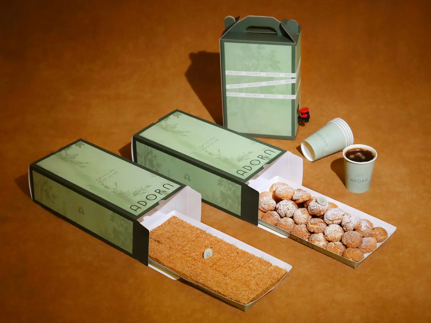 عرض ليالي العيد المكون من ( ترمس قهوة و هرم اكلير و بسبوسة )