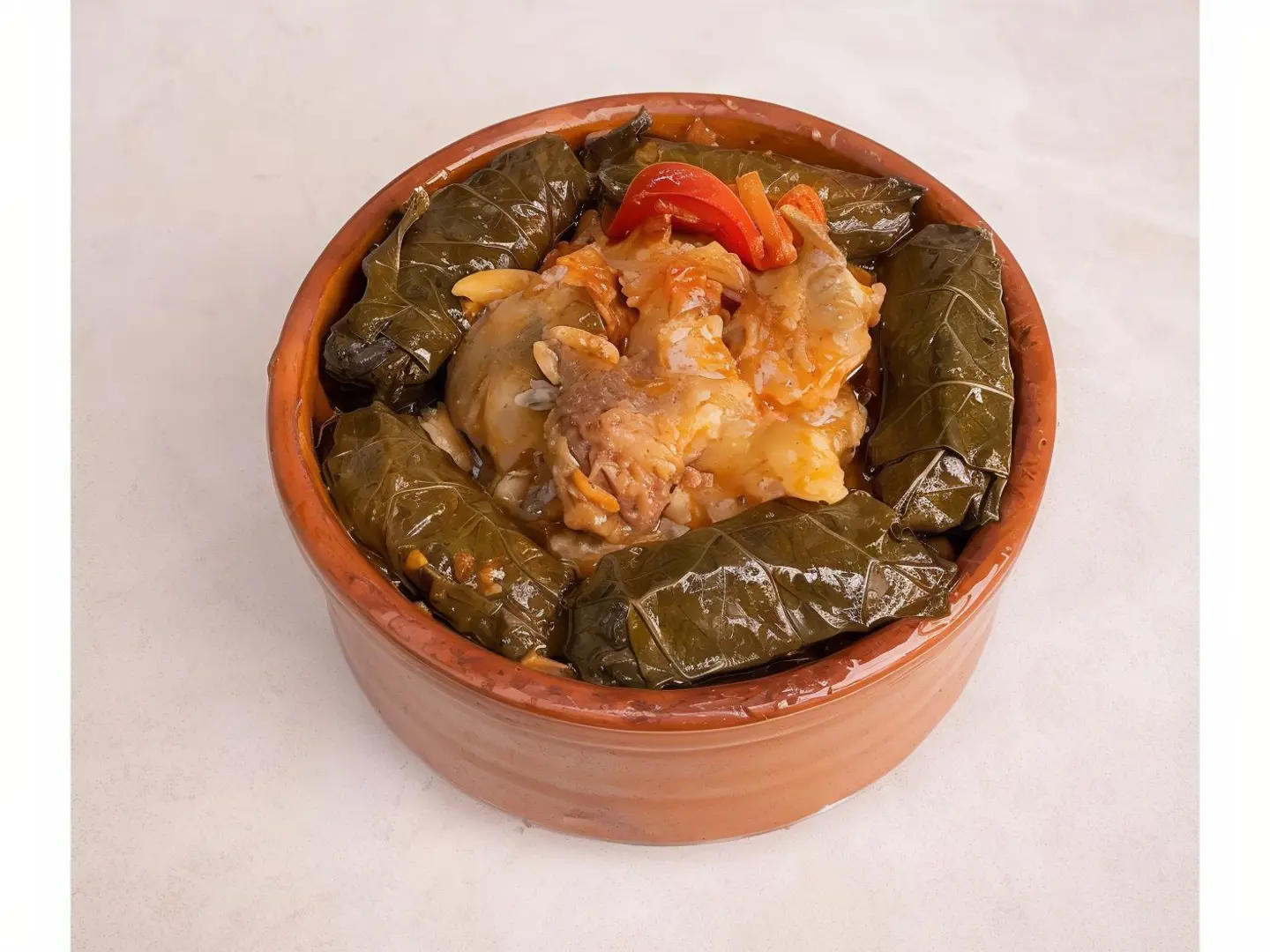 Casserole With Grape Leaves And Cow's Trotters